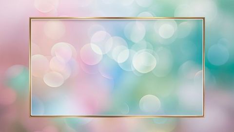 Metallic gold frame floating on pastel bokeh display