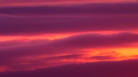 Vibrant Sunset with Stratocumulus Clouds Creating Majestic Horizon