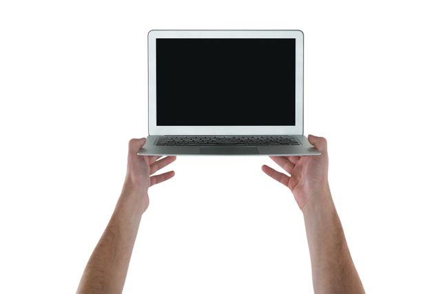 Hand holding laptop against white background