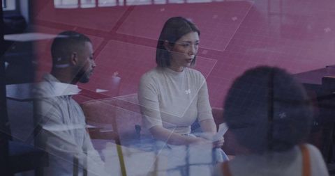 Team collaboration with modern graphic edits in conference room