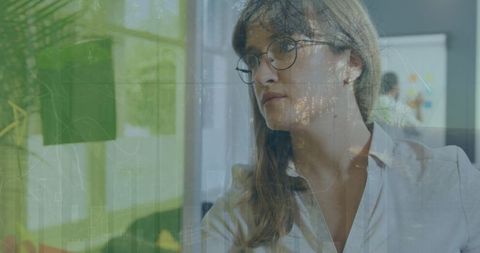 Businesswoman Contemplating Future Innovation in Office