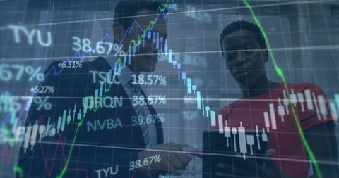 Business professionals reviewing tablet with overlaid stock charts and candlestick data