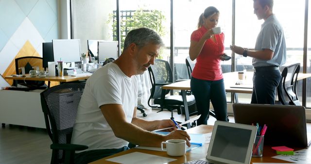 Team Collaborating in Modern Office Workspace - Download Free Stock Images Pikwizard.com