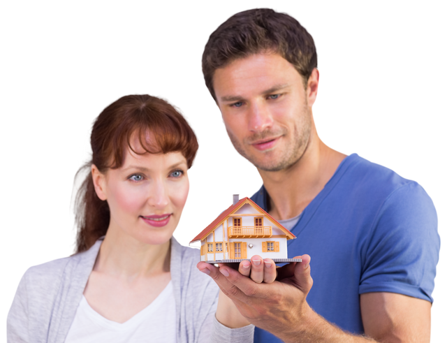 Smiling Couple Holding Transparent Model House for Real Estate - Download Free Stock Videos Pikwizard.com