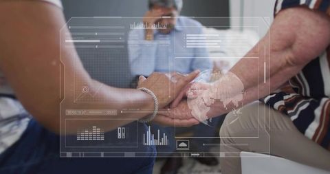 Senior women holding hands consoling in counseling session with augmented data overlay