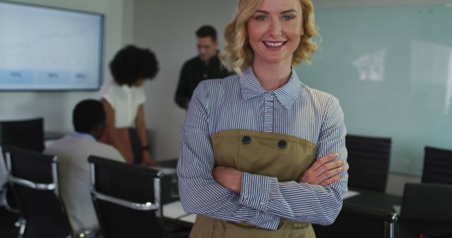 Confident Businesswoman Leading Multiracial Team in Office Meeting - Download Free Stock Images Pikwizard.com