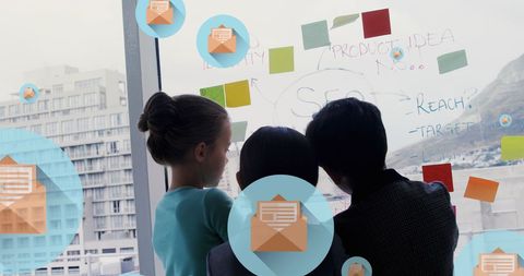 Diverse kids brainstorming project ideas with sticky notes