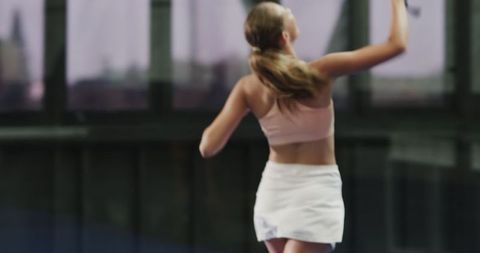 Woman Joyfully Celebrating Victory on Padel Court