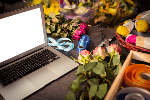 Florist Workspace with Laptop and Colorful Roses for Transparent Background