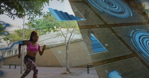 Black woman sprinting in bright workout clothes with ar fitness data overlay in urban plaza