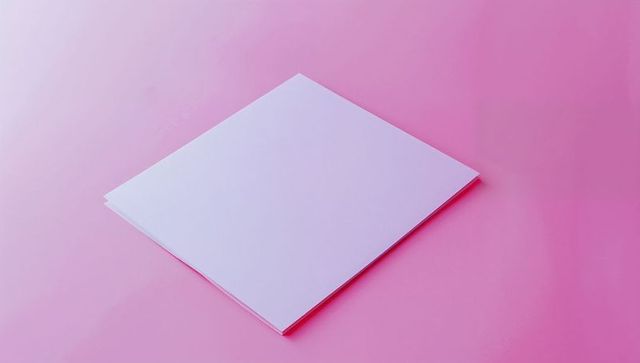 Minimalist white square paper sheets on pink background