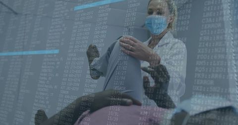 Therapist assisting patient with digital technology overlay