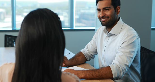 Recruiter taking interview of female candidate in office - Download Free Stock Photos Pikwizard.com