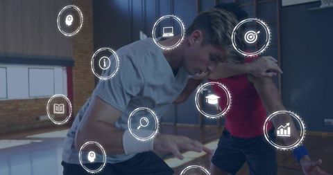 Athletes practicing defensive control using augmented reality training hud on indoor court