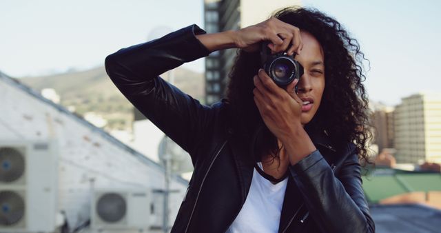 Female Photographer Holding Camera Outdoors - Download Free Stock Images Pikwizard.com