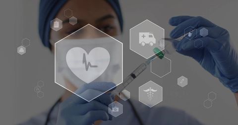 Healthcare professional drawing vaccine into syringe with vial and digital health icons