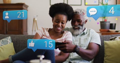 Diverse Couple Engaging with Social Media on Tablet