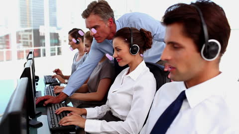 Manager Assisting Diverse Call Center Team with Technology