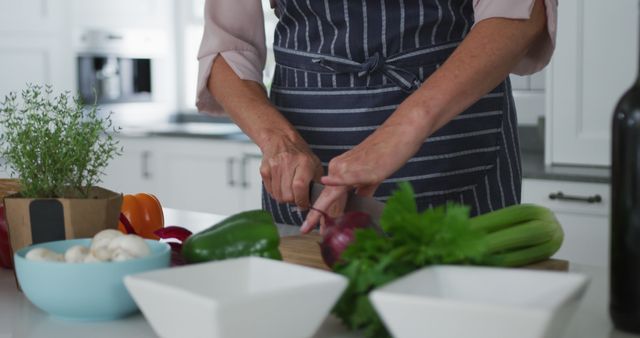 Skillful Chef Slicing Vegetables in Modern Kitchen - Download Free Stock Images Pikwizard.com