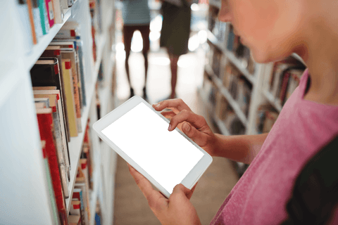 child using tablet in library with transparent focus - Download Free Stock Videos Pikwizard.com