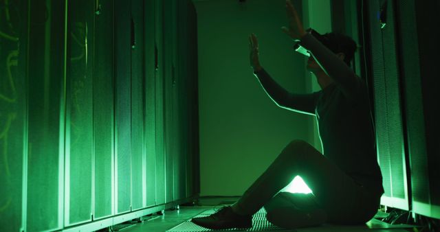 Person Using VR Goggles in Dark Data Center - Download Free Stock Images Pikwizard.com