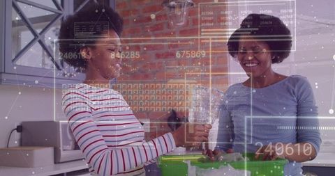 Mother and daughter rinsing glasses in kitchen with green basin and tech hud overlay