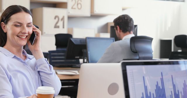 Smiling Woman Talking on Phone in Modern Office Setting - Download Free Stock Images Pikwizard.com