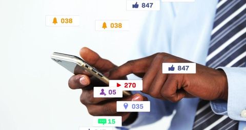 Businessman tapping smartphone and checking social media notifications, engagement badges