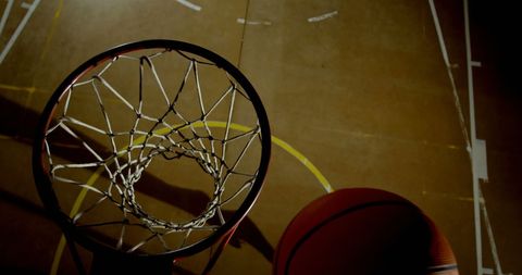 Dramatic Basketball Moment with Hoop View in Indoor Gym - Download Free Stock Images Pikwizard.com