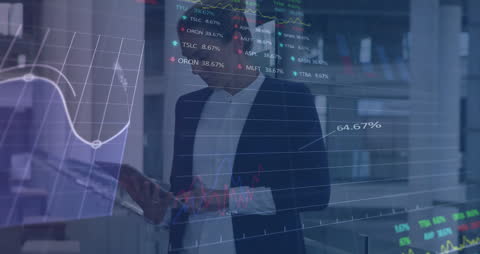 Businesswoman Analyzing Financial Data with Tablet Technology