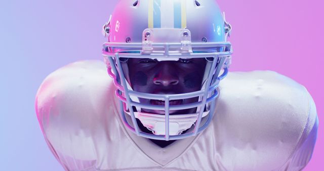 American Football Player Focused Under Neon Lights - Download Free Stock Images Pikwizard.com