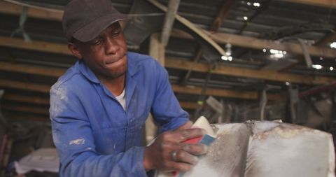 Skilled Worker Sanding Car in Township Workshop, South Africa - Download Free Stock Images Pikwizard.com