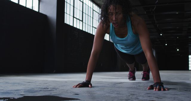 Fit Woman in Athletic Clothing Performing Plank Exercise Indoors - Download Free Stock Images Pikwizard.com