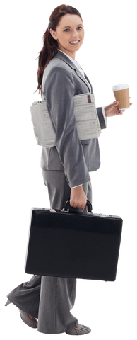 confident professional woman walking with documents and coffee - Download Free Stock Videos Pikwizard.com