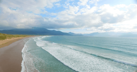 panoramic transparent ocean waves rolling on sandy shore - Download Free Stock Videos Pikwizard.com