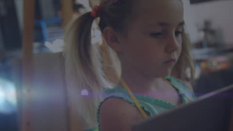 Child Engaged in Creative Art Project at School