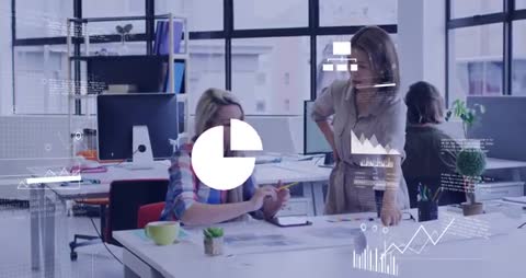 Team Collaboration on Creative Project in Modern Office with Data Visualization