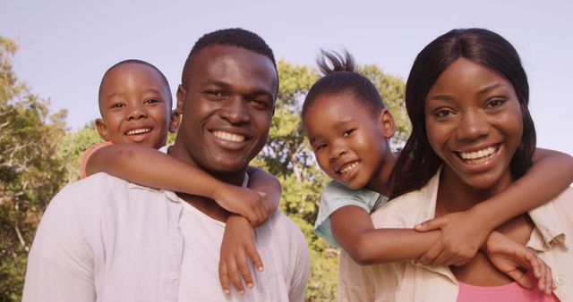 Happy African American Family Smiling Outdoors - Download Free Stock Images Pikwizard.com