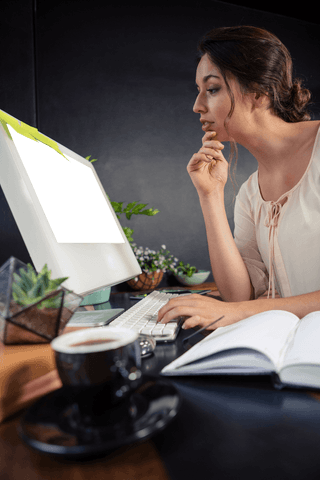 transparent businesswoman focused working at computer in office - Download Free Stock Videos Pikwizard.com
