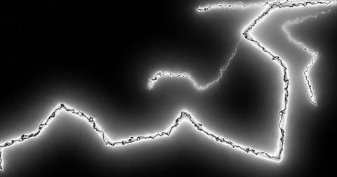 White lightning bolts on black abstract energy concept