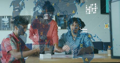 Team Analyzing Global Data Visuals in Modern Conference Room