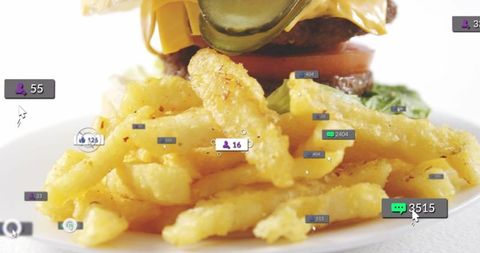 Crispy crinkle-cut fries showcasing cheeseburger with social media engagement overlays