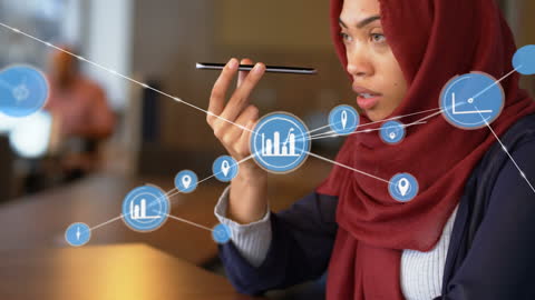 Businesswoman in Hijab Engaging with Digital Interface on Smartphone