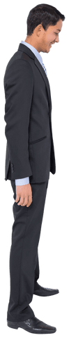 Smiling Businessman in Suit Looking Down on Transparent Background