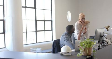 Multicultural Team Collaborating in Modern Office Space