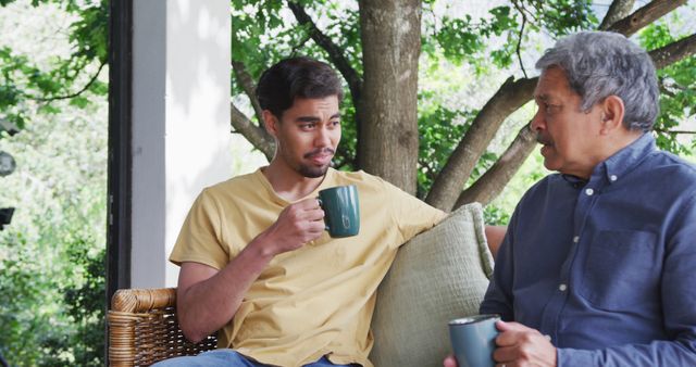 Two Generations Enjoying Coffee on Patio - Download Free Stock Images Pikwizard.com