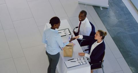 Diverse Politician Meeting Voter at Polling Station
