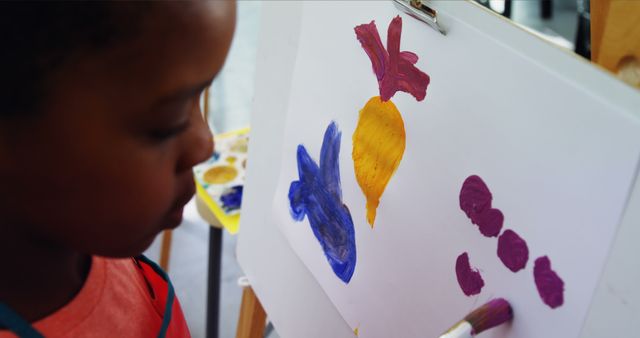 Child Painting Vegetables on Easel Developing Art Skills - Download Free Stock Images Pikwizard.com