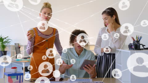 Diverse Colleagues Discussing Social Network Connections in Office