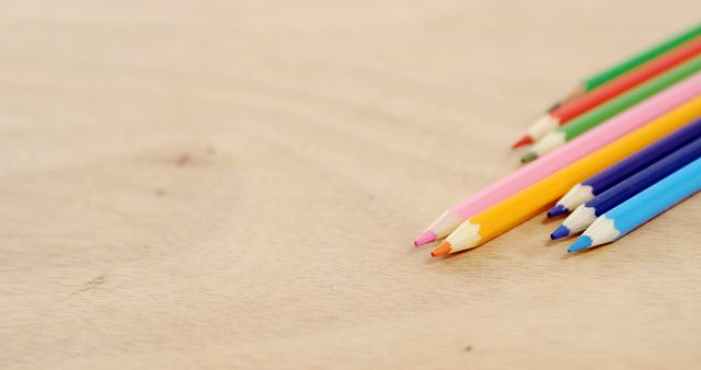 Colorful Pencils Arranged on Wooden Surface - Download Free Stock Images Pikwizard.com